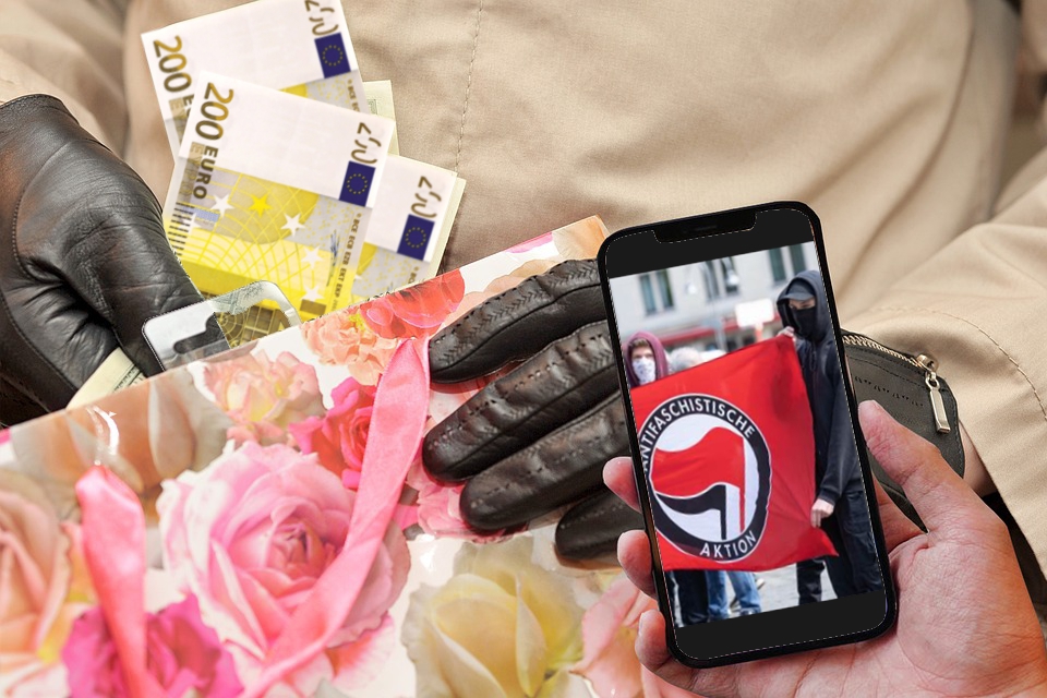 Behandschuhte Hände schieben große Geldscheine in eine Geschenktüte, davor ein Smartphone mit Antifa-Foto.